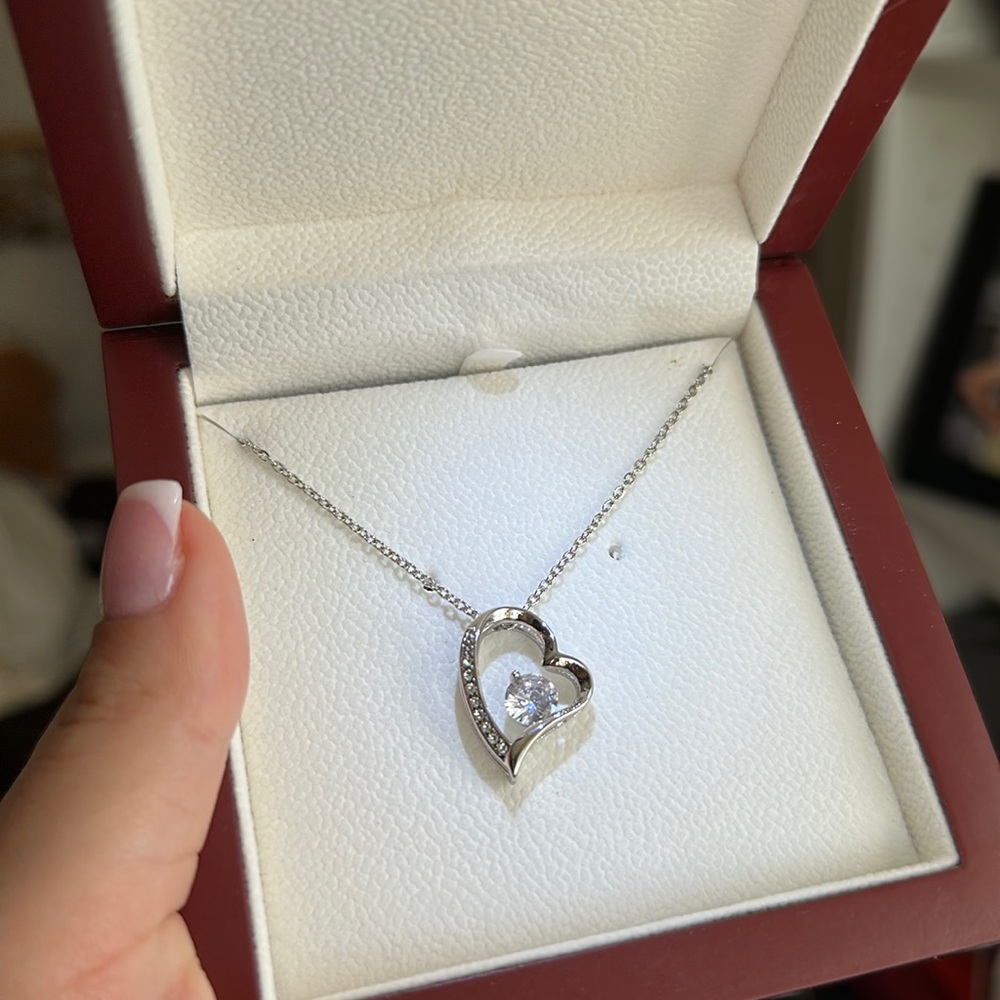 Diamond in a heart white gold plated necklace